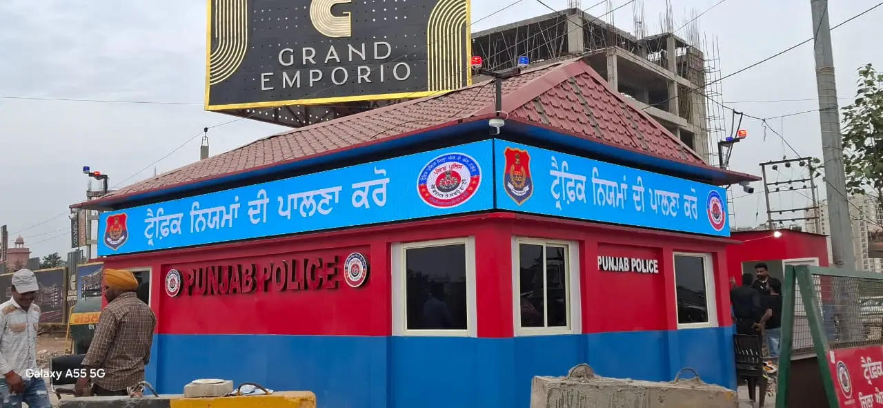 Full-colour LED signage band on a police booth